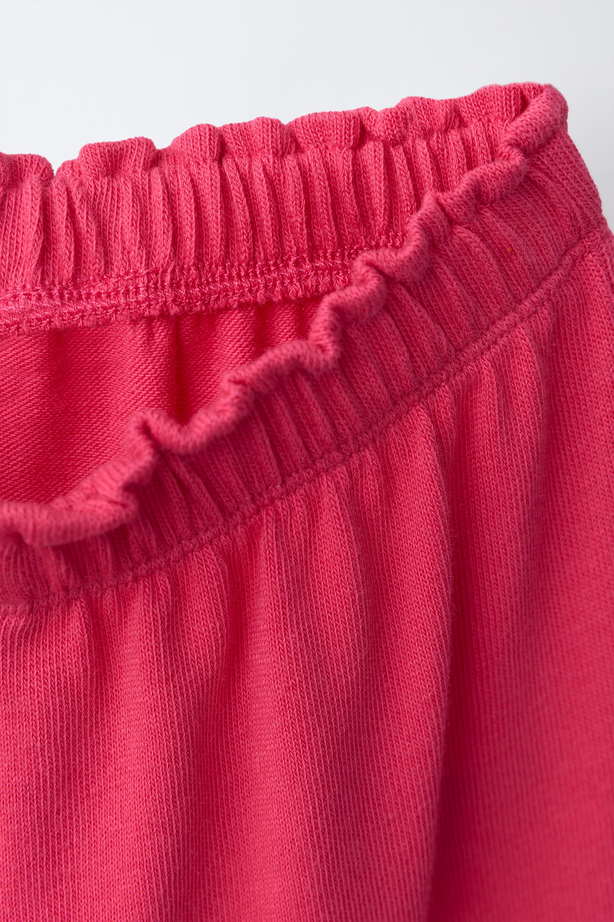 JUPE-CULOTTE À VOLANTS